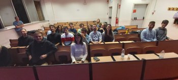 Pulkit and his class mates in a classroom at the Universty of Bologna