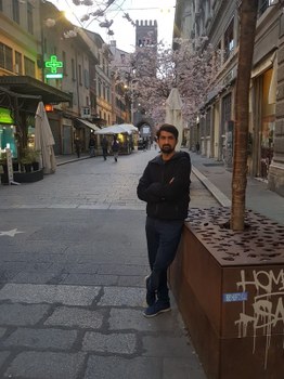 Sharafat walking in Bologna