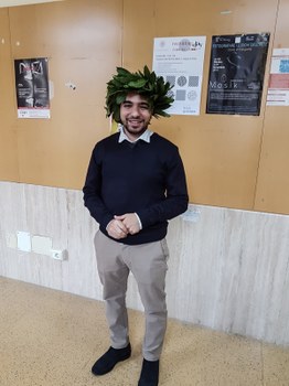 Tareq wearing a laurel crown on his graduation day
